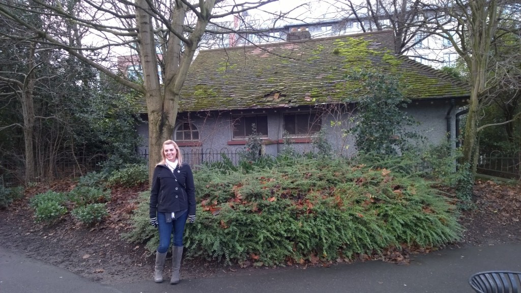 Monika in front of moss covered cottage in Saint Stephens Green